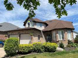 Custom Maintenance team cleaning windows